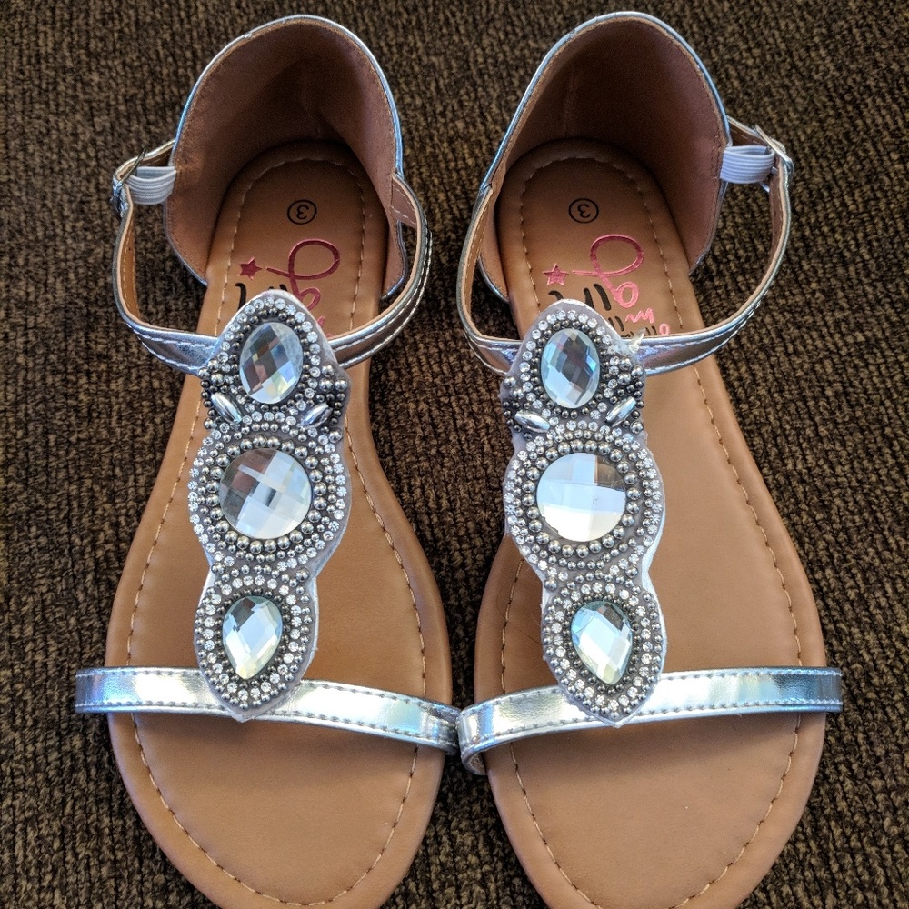 Girls Olivia Miller Girl sandals.